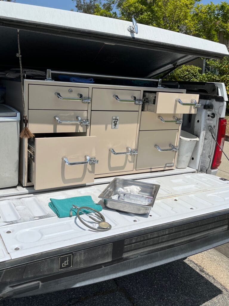 A truck with many drawers and a metal box